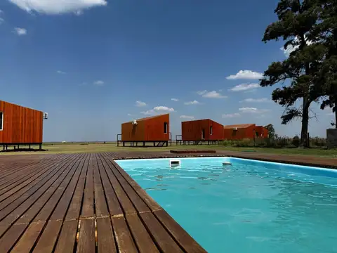 VENTA - COMPLEJO DE CABAÑAS EN MELINCUE FRENTE A LA LAGUNA