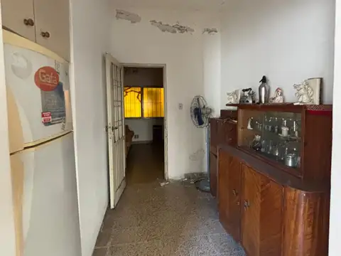 casa americana con entrada por pasillo  ( lote propio)
