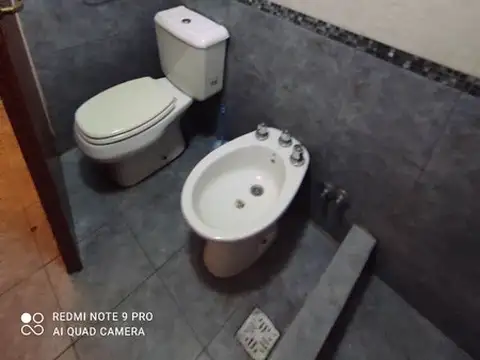 Departamento tipo casa al fondo con patio   2 ambientes amplio estado impecable