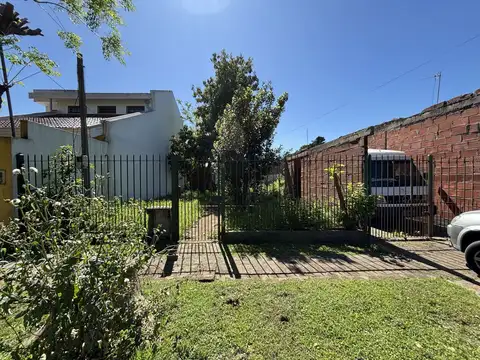 Lote 325m² con garaje a terminar y casa a reciclar