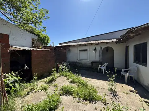 Lote 325m² con garaje a terminar y casa a reciclar