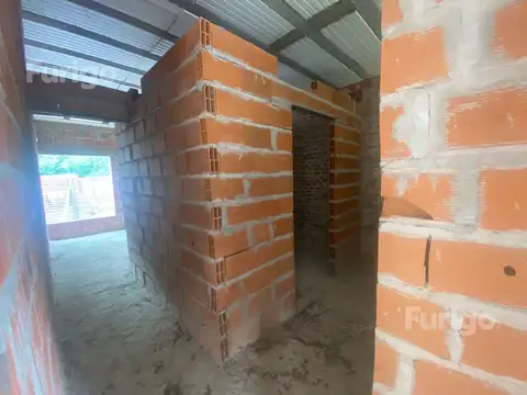 Terreno y construcción a terminar