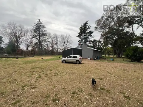 Campo Mixto de 30 hectáreas en San Andrés de Giles, a metros del asfalto, con casas y galpones