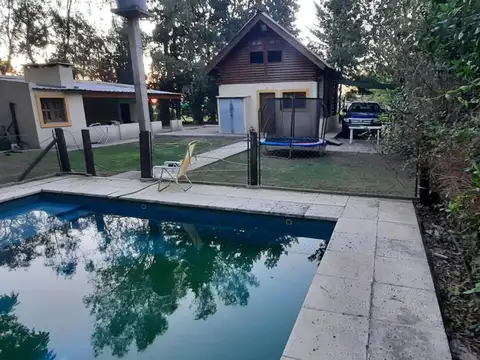 DEPTO Y CABAÑA con piscina  sobre dos lotes en San Vicente