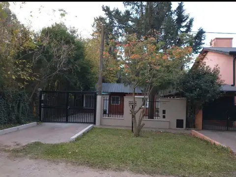 VENTA DE CASA DE DOS DORMITORIOS EN FUNES CENTRO