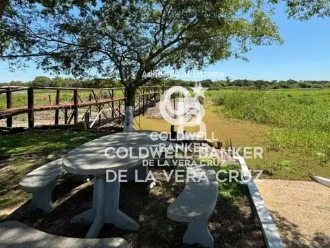 CASA, QUINCHO, PILETA Y BAJADA AL RIO .