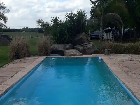 Casa de campo a terminar con quincho/depto con amplia pileta