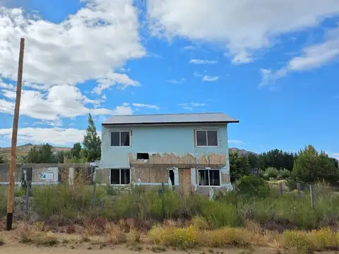 Terreno con obra a terminar 6 deptos sobre ruta
