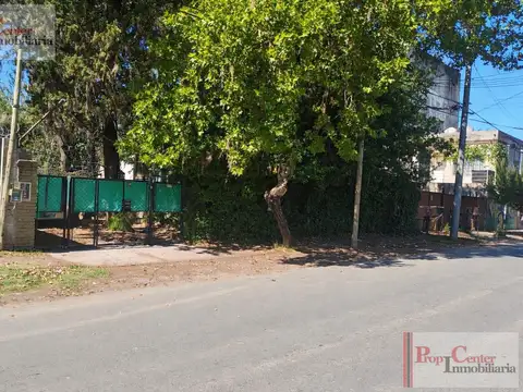 Terreno CON MEJORAS 