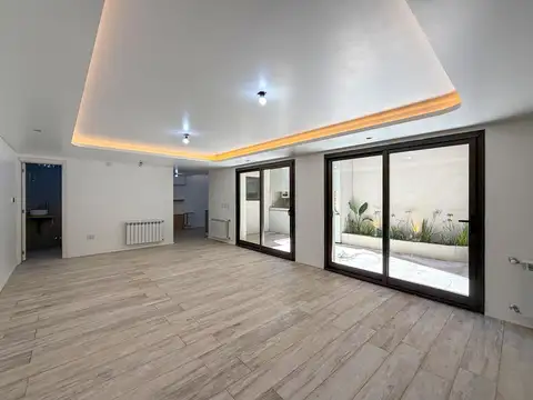 Casa de pasillo único de 3 dormitorios con patio y parrillero