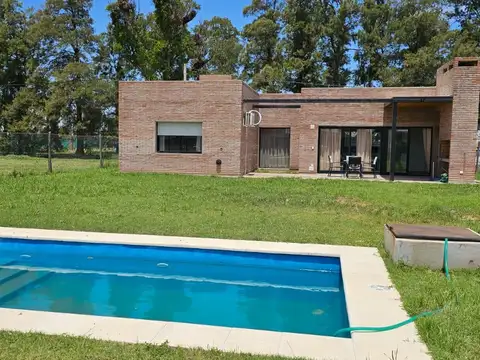 Casa amoblada 2 Dormitorios -  Barrio Los Molinos, Roldan
