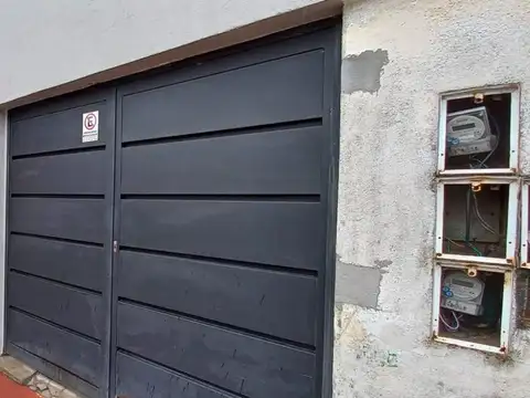 Propiedad q/consta de 4 Casas y un local comercial