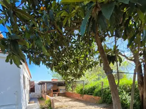 VENTA CASA en Villa Carlos Paz, 4 dormitorios, QUINCHO Y JARDÍN