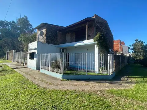 CASA DE 3 AMBIENTES CON FONDO Y LOCAL COMERCIAL