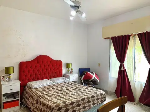 Casa de 3 dormitorios con patio y cochera en venta en Juan Manuel Gutierrez sobre Calle 455 [Cod: ]