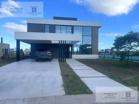 Casa a estrenar sobre laguna · 4 dorm. · Piscina climatizada · Barrio Magallanes