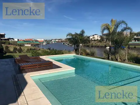 Excelente casa moderna en Albanueva, como nueva, gran calidad, pileta, amarra frente al rio