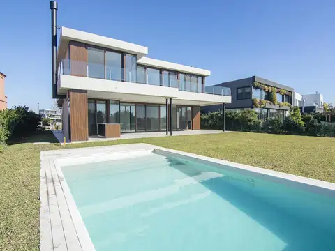 Casa de diseño con 5 suites a la laguna, a estrenar en Virazon, Nordelta