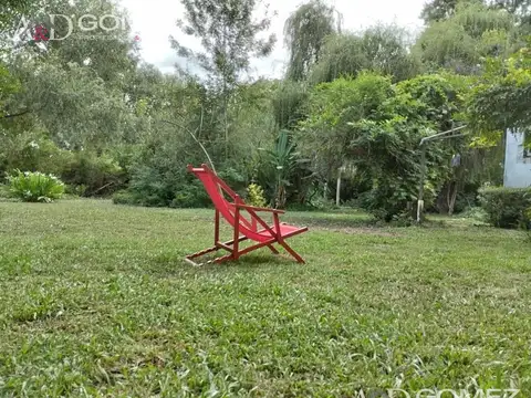 TERRENO EN ISLA CON 2 CASAS