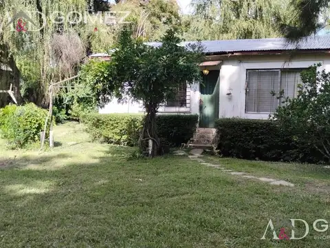 TERRENO EN ISLA CON 2 CASAS