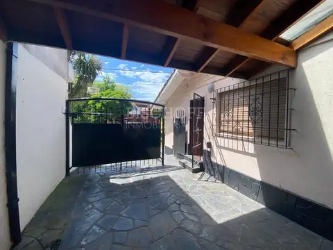 CASA 4 AMBIENTES CON COCHERA, MAS DEPARTAMENTO 3 AMBIENTES