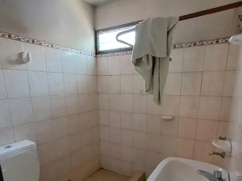 Lote en venta con tres casas