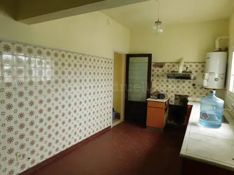 VENTA DEPARTAMENTO CASA EN PRIMER PISO EN CHASCOMUS ZONA CENTRICA