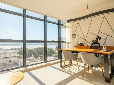 Oficina con vista al río y frente al Monumento a la Bandera