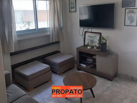 Depto de 3 ambientes en un 12° piso al frente con balcón, cochera fija cubierta y baulera 