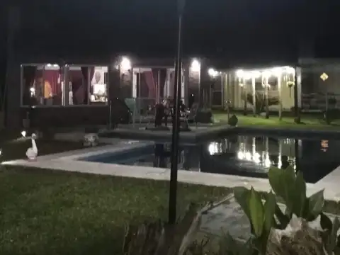 Terreno en venta en General Lagos, con quincho nuevo impecable, parrillero y contenedor con 2 dormitorios