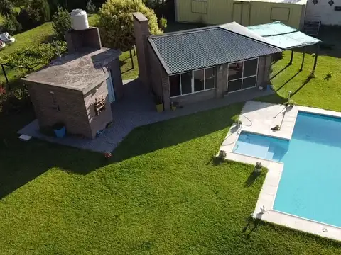 Terreno en venta en General Lagos, con quincho nuevo impecable, parrillero y contenedor con 2 dormitorios