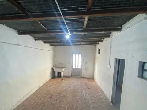 dos galpones sobre ruta 2 con vivienda