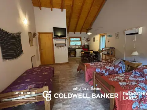 VENTA CASA 100m2 mas 2 cabañas de 41m2 en lote de 1.300m2 con costa de arroyo, Villa la angostura.