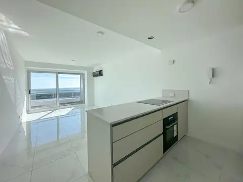 Departamento de 1 dormitorio con cochera y amenities en Alquiler