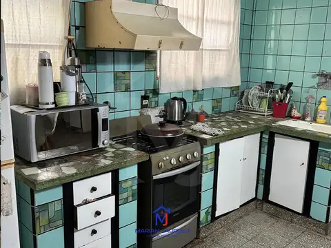 CASA CON LOCAL CENTRICO EN VENTA