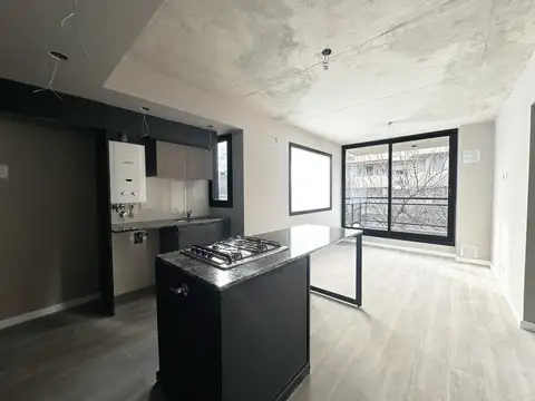 Departamento en venta en  Abasto, Rosario 1 dormitorio c/ patio y excelente calidad constructiva.