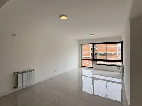 DEPARTAMENTO 2 AMBIENTES DE MODERNO DISEÑO CON COCHERA CUBIERTA