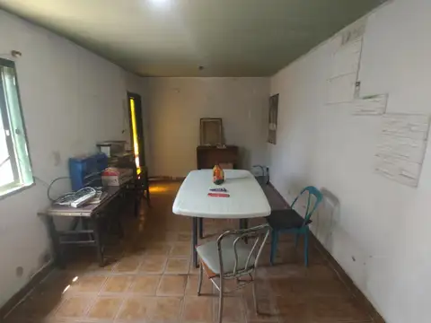 Casa de material con techo de losa cerámica en Gonzalez Catan