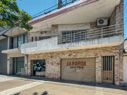 Local comercial con casa de 2 dormitorios sobre importante corredor