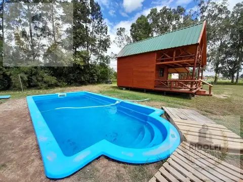 Cabaña Alpina 3 ambientes equipada con cochera con lote chacra de 2000 m2 Villa Ruiz