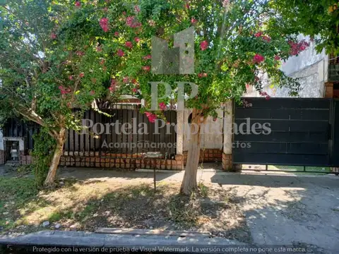 LOTE CON MEJORAS EN ITUZAINGO