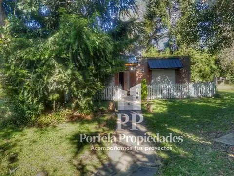 CASA QUINTA DE 4 AMBIENTES CON AMPLIO PARQUE