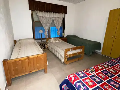 PROPIEDAD CON PATIO AMPLIO Y ARBOLES FRUTALES