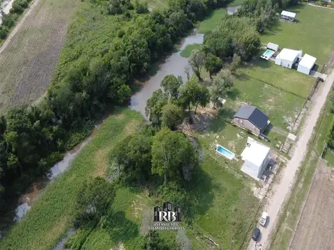 LA MARTINA - PUERTO TIROL (TERRENO SOBRE EL RIO)