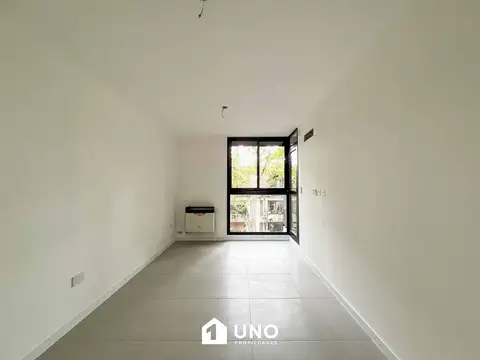 Santiago y Av. Pellegrini - Dpto de 2 Dormitorios Externo. Posibilidad cochera.