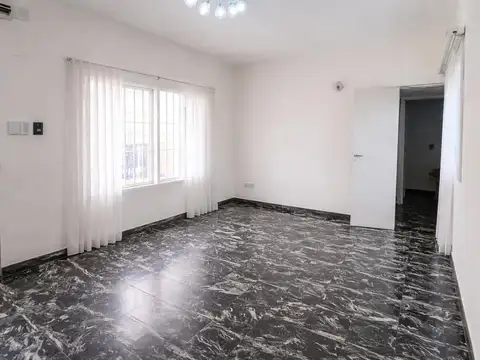 VENTA: Dos casas con dos cocheras sobre terreno de 208 m2 en Refinerias, Rosario