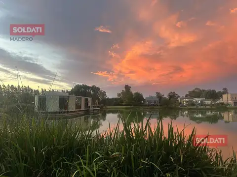 Lote frente a Laguna en La candida con amenities