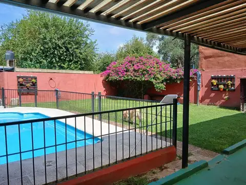 VENTA SALON CON DEPARTAMENTO EN GONZALEZ CATAN