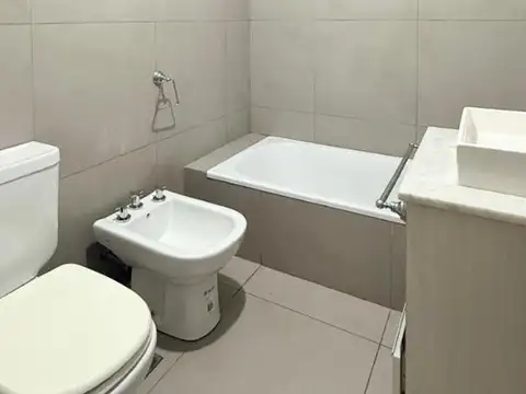 DEPARTAMENTO 2 AMBIENTES CON COCHERA - MERLO SUR
