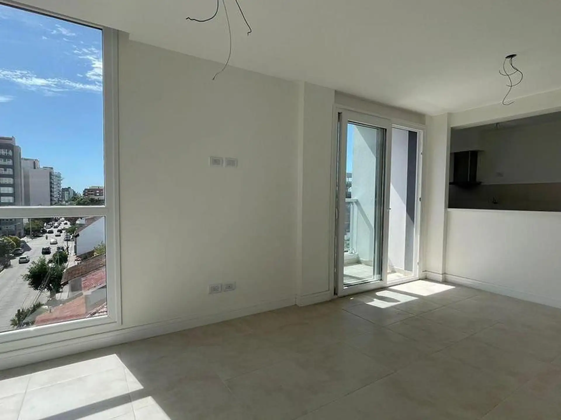 Departamento de dos ambientes con balcon y cochera a estrenar